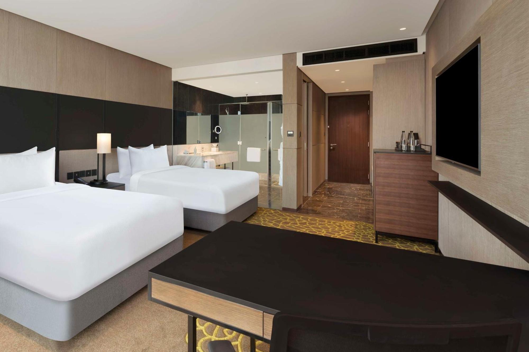 ホテル Hilton Bengaluru Embassy Manyata Business Park エクステリア 写真