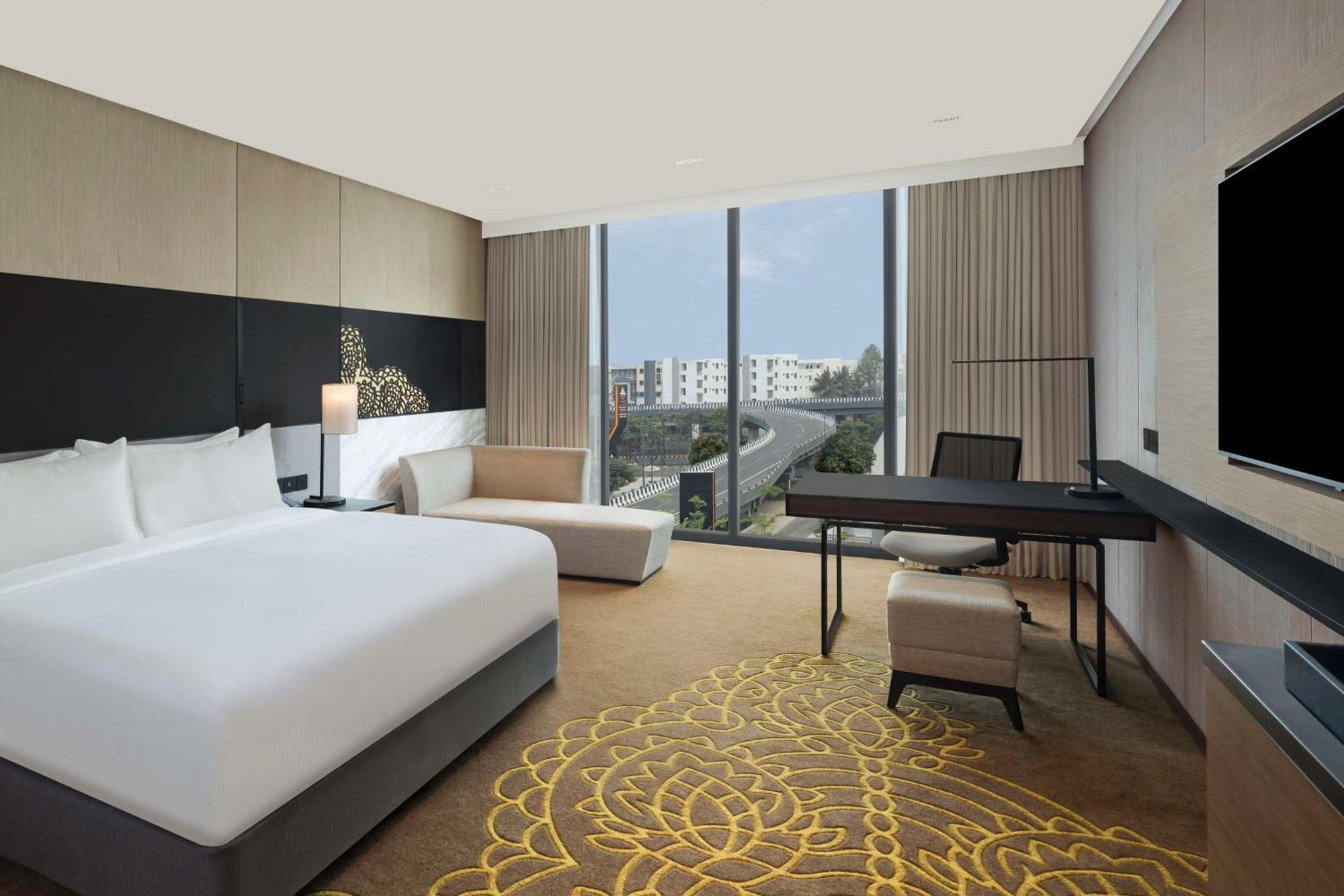 ホテル Hilton Bengaluru Embassy Manyata Business Park エクステリア 写真