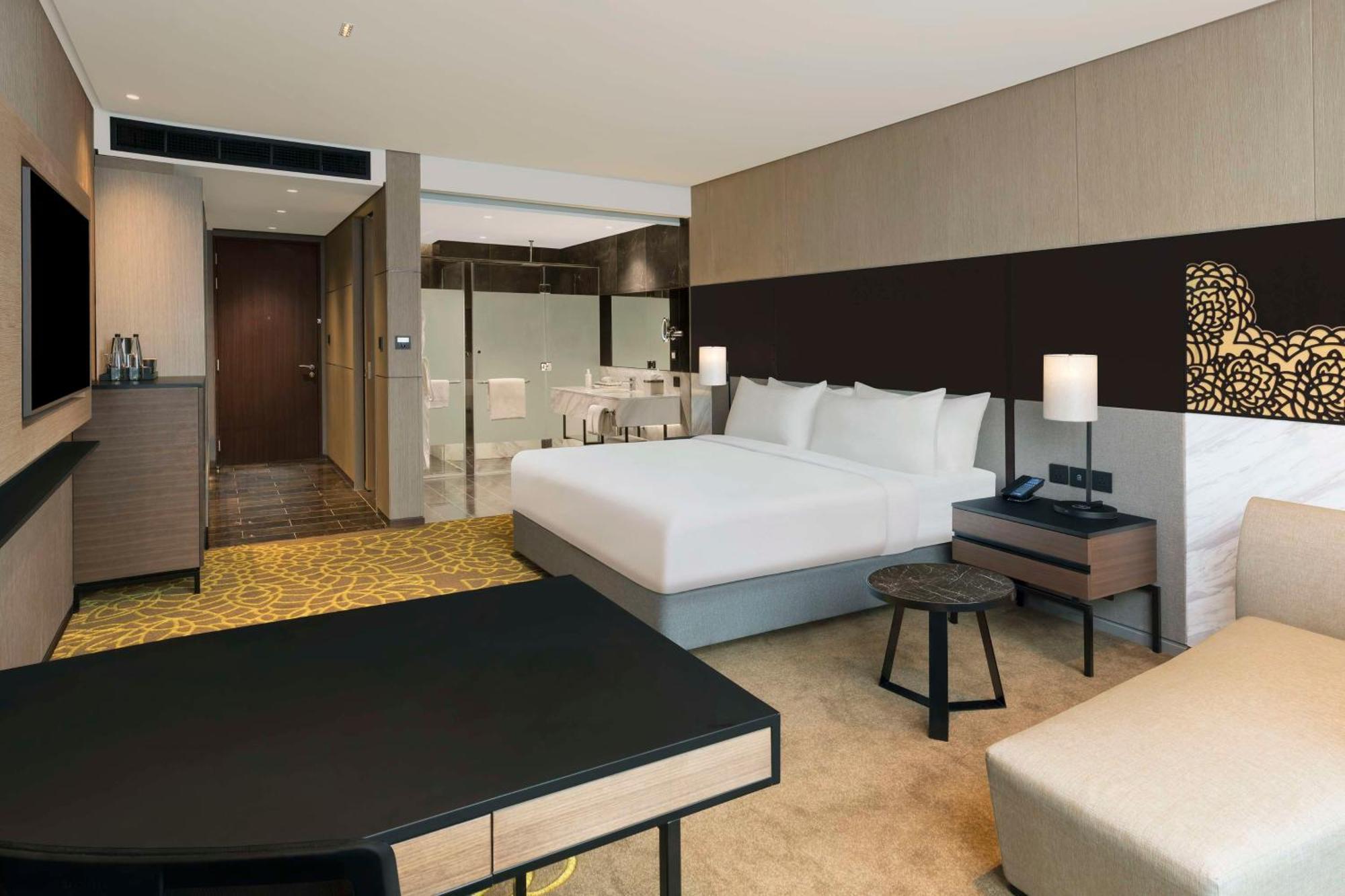 ホテル Hilton Bengaluru Embassy Manyata Business Park エクステリア 写真