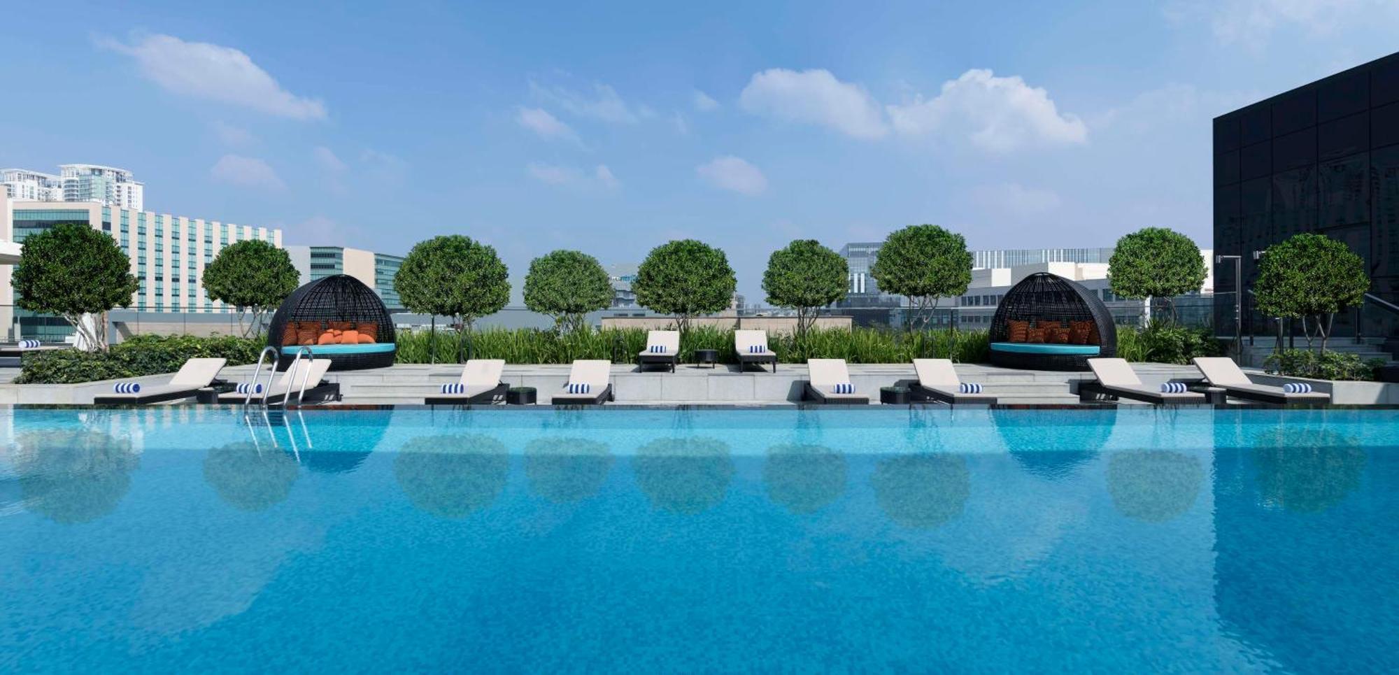 ホテル Hilton Bengaluru Embassy Manyata Business Park エクステリア 写真