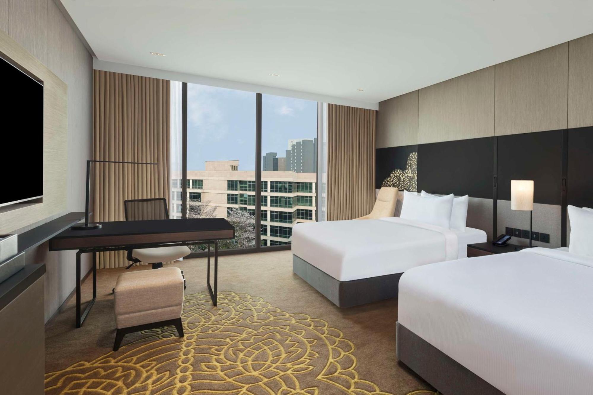 ホテル Hilton Bengaluru Embassy Manyata Business Park エクステリア 写真