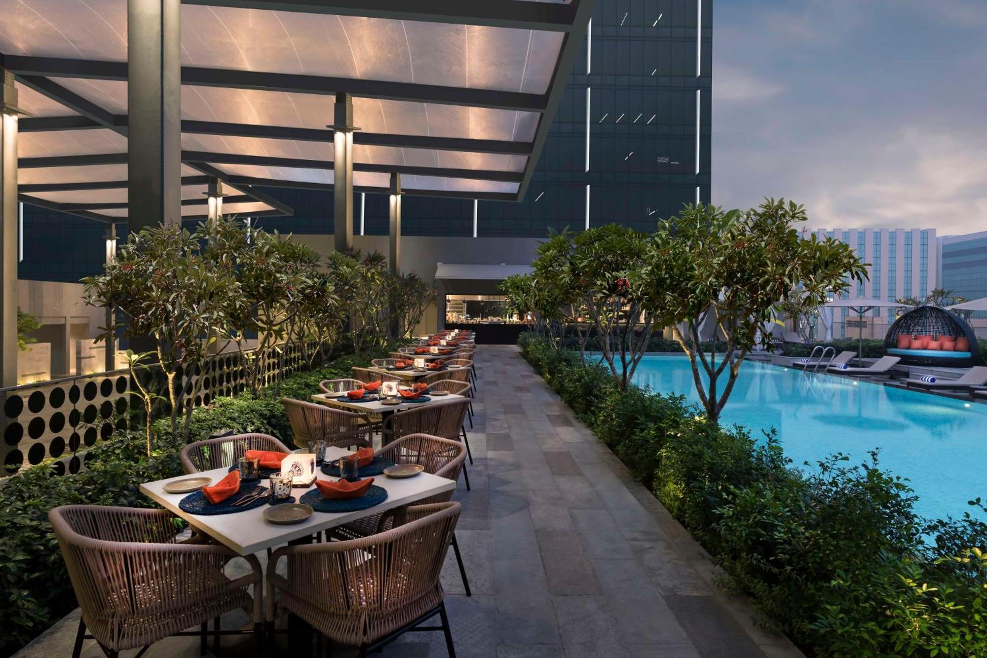 ホテル Hilton Bengaluru Embassy Manyata Business Park エクステリア 写真